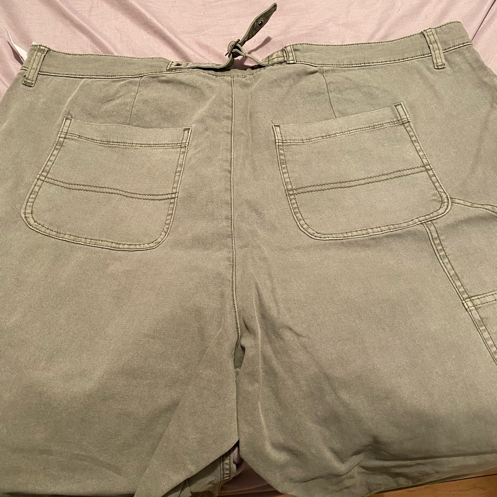 Two brand new pairs of Old Navy Jeans - sage green and cream.